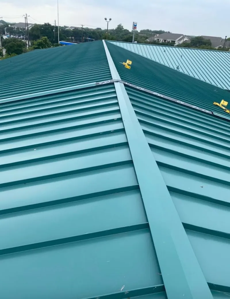 Green commercial metal roof ridge and valley for Metal Roof Repair in Josephine